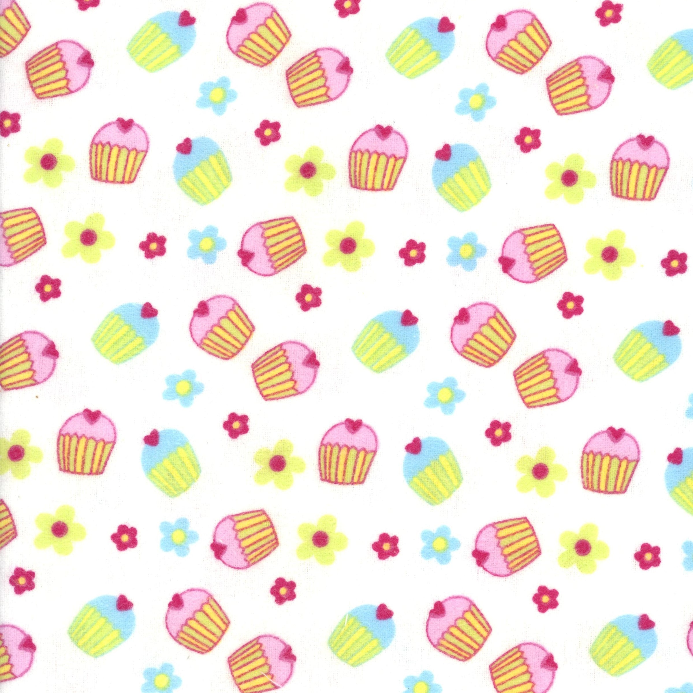 Kennard & Kennard Cupcake Flannelette - Patchwork and Quilting Fabric from Brown's Craft Shed (Tags: Fabric blue cupcakes flannelette flowers green hearts Kennard & Kennard novelty pink playful white )